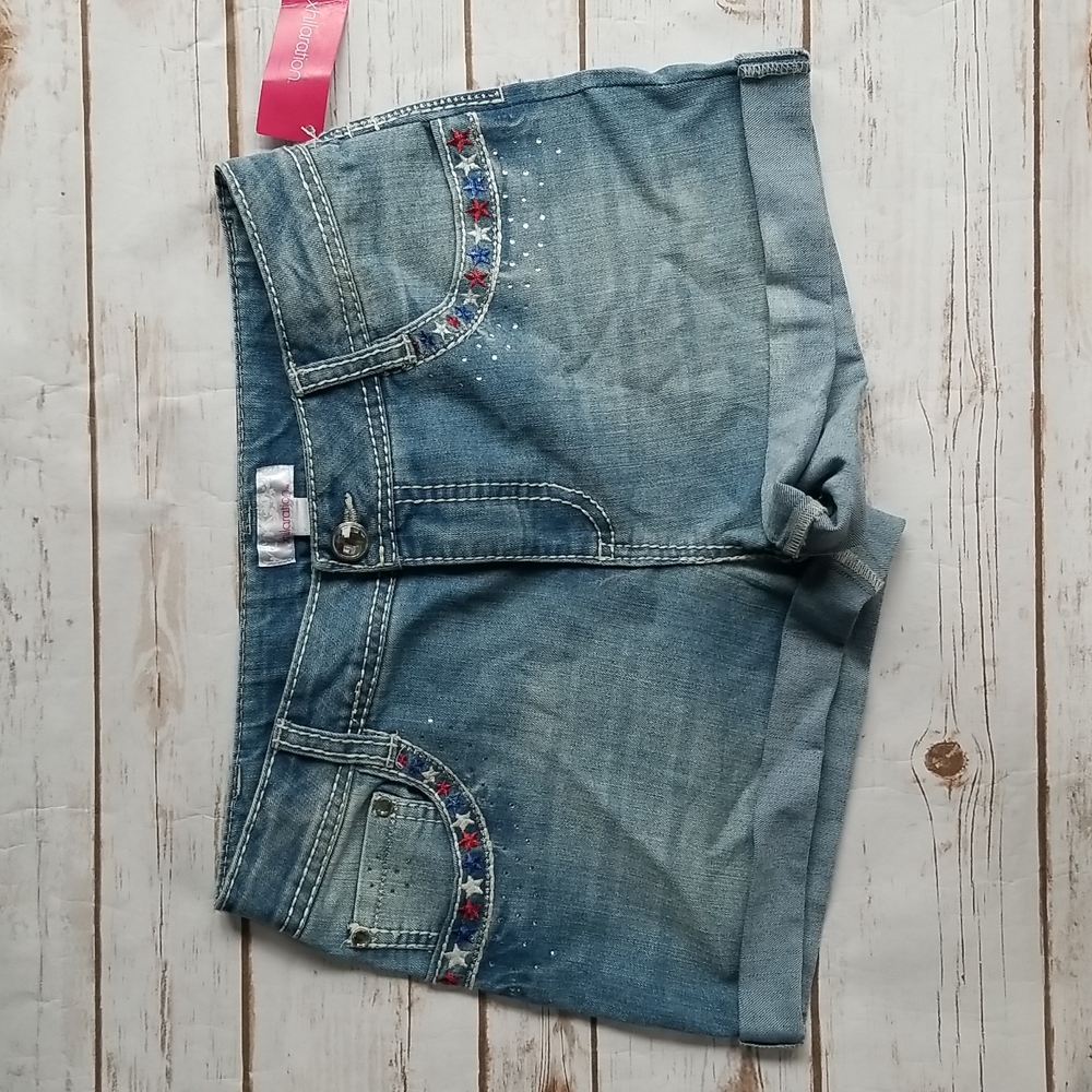 Girls denim shorts. New size 14 - 16